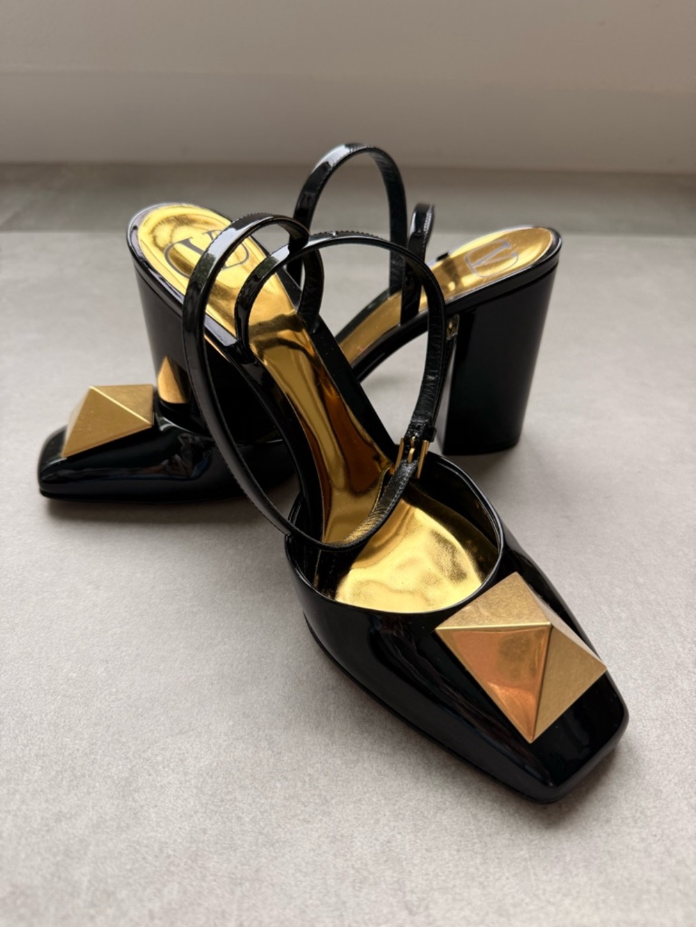 Valentino Garavani Black Patent Slingback Pumps with Gold Pyramid Detail